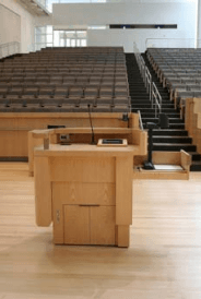 Image of a podium in a lecture hall
